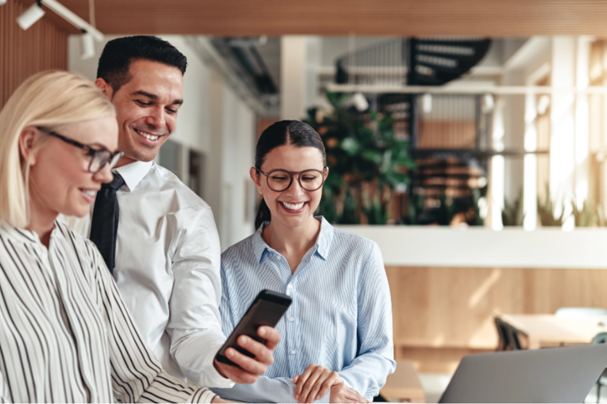 People collaborating on phone